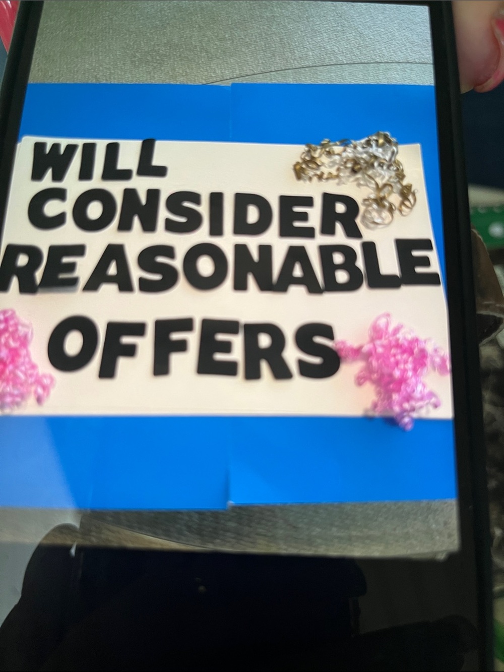 Statement Sign with Black Text and Blue Accents